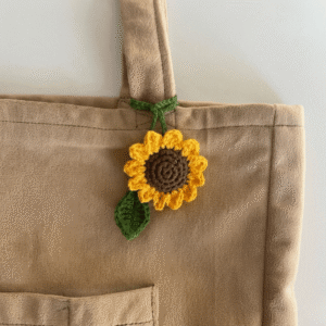 Lesezeichen Bookish, gehäkelte Sonnenblume als Bag Charm, Buchzubehör, kleines Geburtstagsgeschenk für Leser